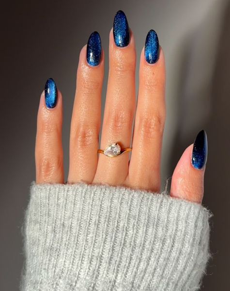 Image may contain Body Part Finger Hand Person Accessories Diamond Gemstone and Jewelry